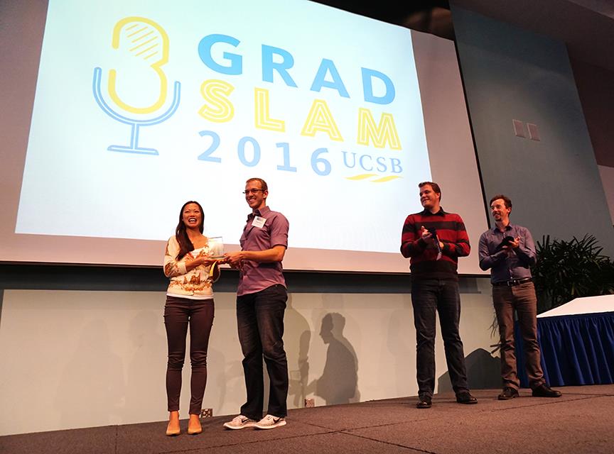 leung_hieber_rogers_willard_DSC03901_web Nicole Leung accepts the trophy from 2015 Grad Slam Champion Danny Hieber, while runners-up Phillip Rogers and Geoff Willard applaud. Credit: Patricia Marroquin